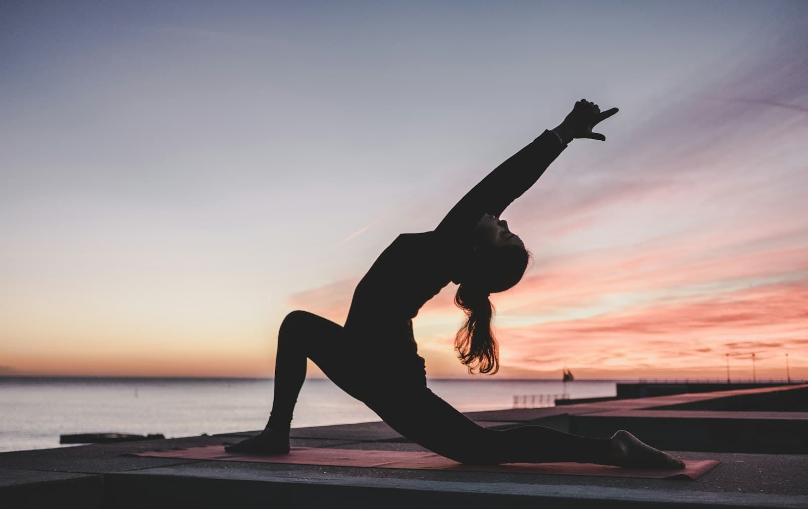 Yoga at sunset on the water