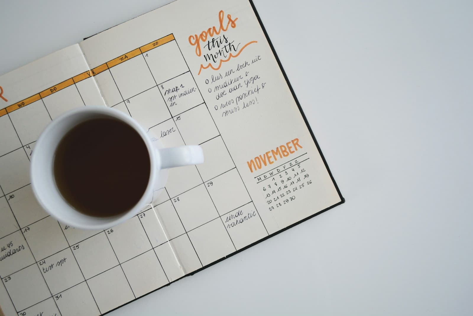 Open planner and coffee